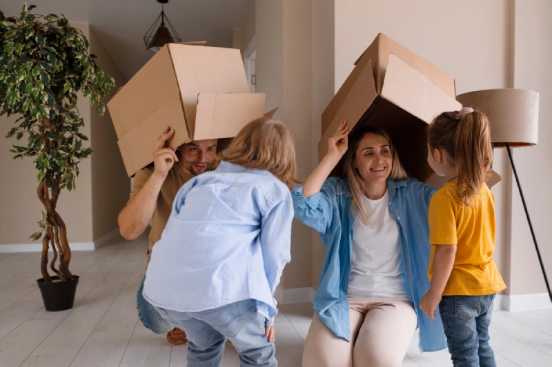 happy-family-with-kids-moving-their-new-home